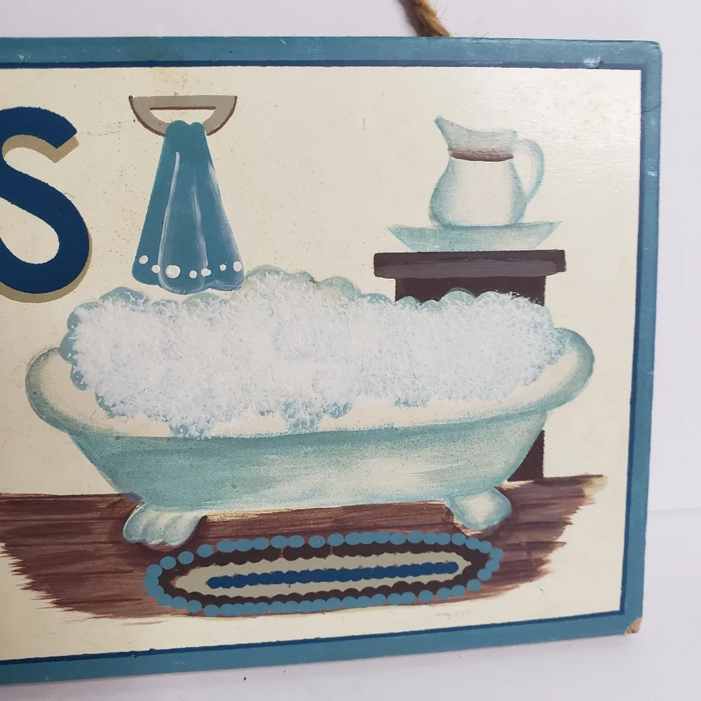 Decorative sign for a bathroom. 221